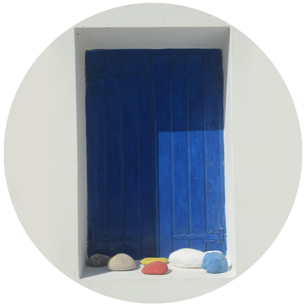 The Blue Door and Rocks of Milos Greece